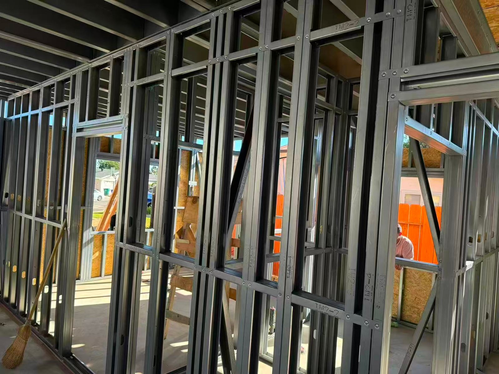 Steel stud installation detail within project frame